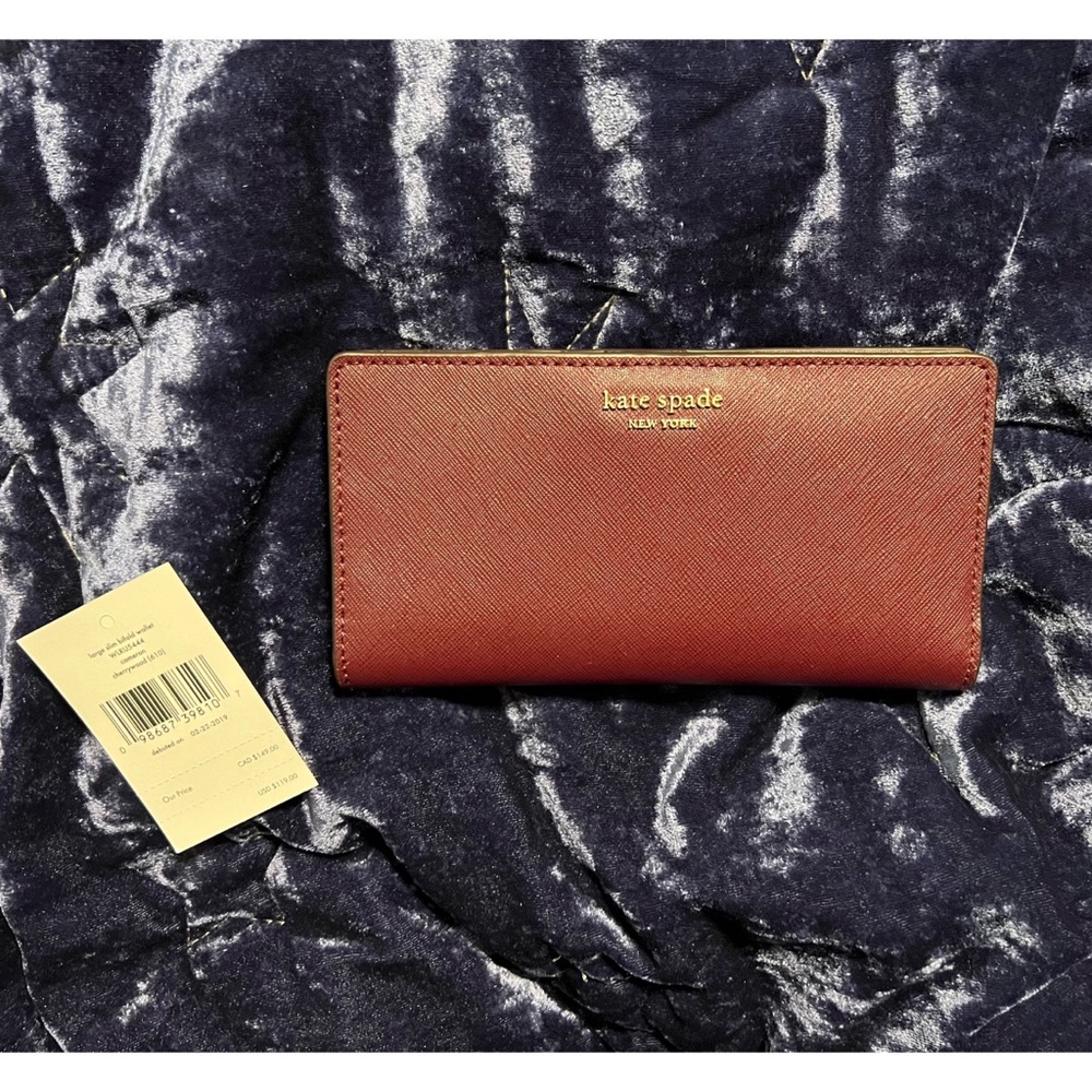 NWT Kate spade large slim bifold wallet in cherrywood